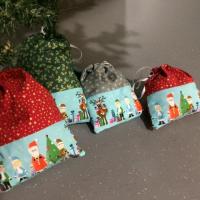 Pochettes cadeaux de Noël avec la frise 